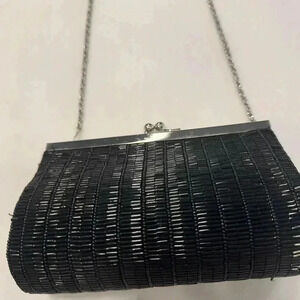 Vintage kiss lock small beaded purse. Black with Silver hardware and chain.